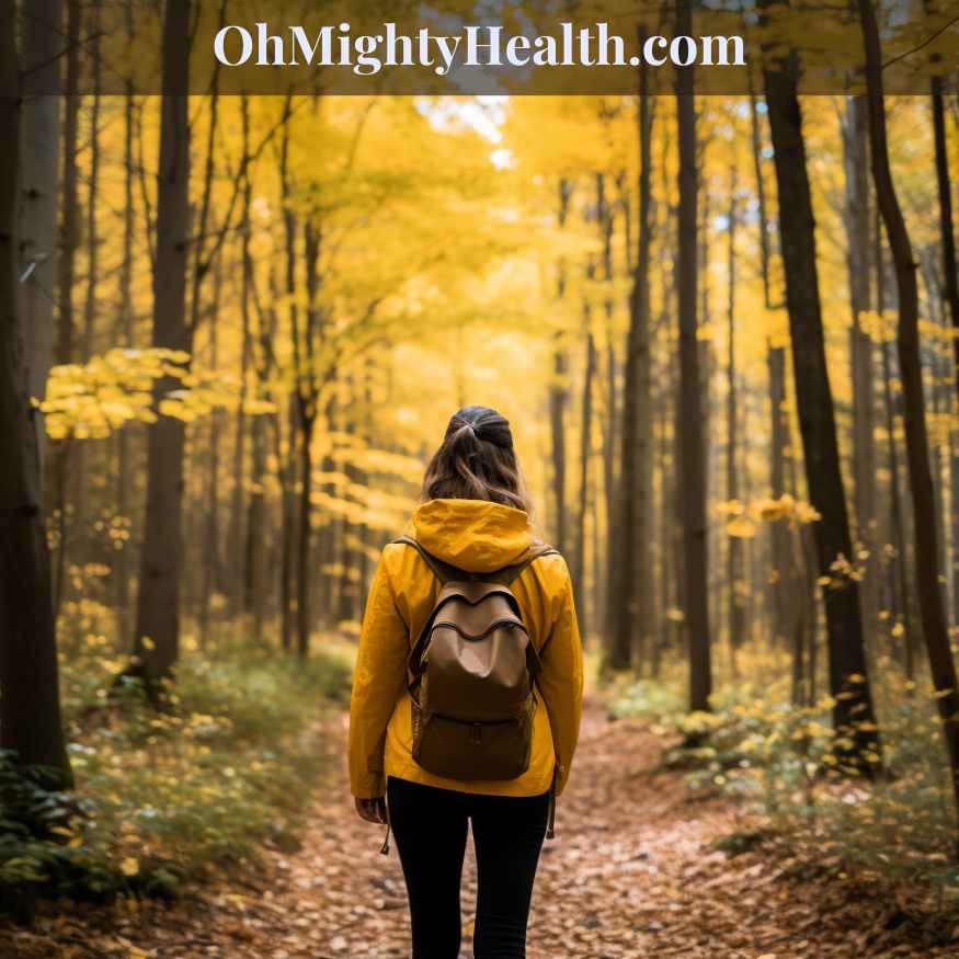 A person engaging in forest bathing, deeply connected with the natural surroundings during a peaceful walk